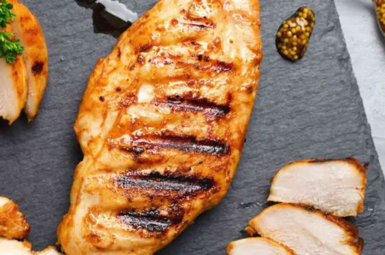 A close-up view of a cooked chicken breast, highlighting the protein content in chicken.