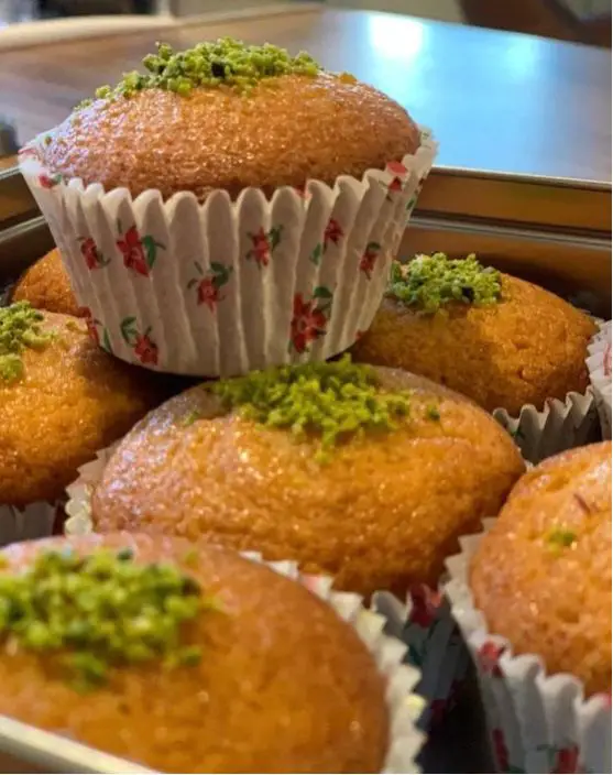 Freshly baked Persian Muffins (Cake Yazdi) served with Persian tea.