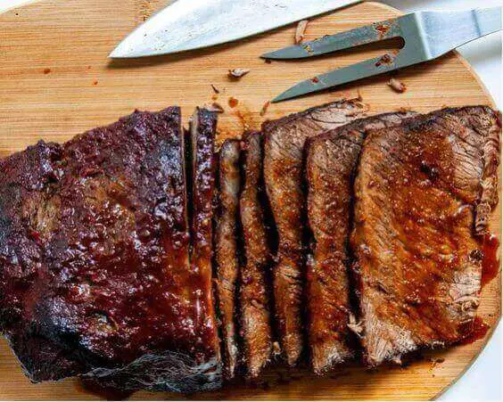 Close-up of a beef brisket cut, relevant to the Brisket is Beef or Pork debate