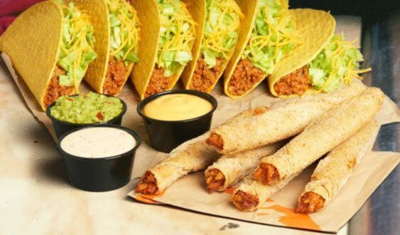 Taco Bell Rolled Chicken Tacos served with dipping sauces